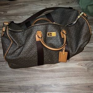 Used MK full sized Duffle Bag